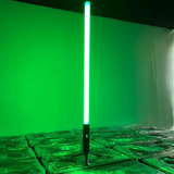 It features 192 RGBWA LEDs for full-color 360° illumination, with an IP65-rated aluminum housing, 9600mAh battery, wireless DMX control, and OLED display for versatile outdoor lighting setups. About 1.5 meters (59" inches) tall. Resembles a lightsaber.
